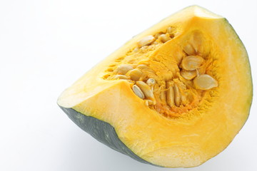 Quarter cut pumpkin on dish for food ingredient