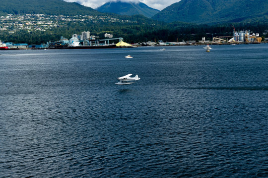 Seaplane hugging the water, Vancouver, BC, Canada