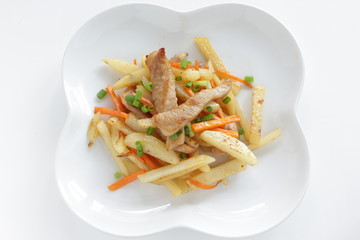 Pork neck meat and potato stir fried for asian food
