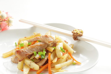 Pork neck meat and potato stir fried for asian food