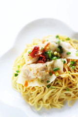 Chinese food, jiozi dumpling and noodles with chili sauce 