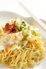 Chinese food, jiozi dumpling and noodles with chili sauce 