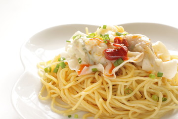 Chinese food, jiozi dumpling and noodles with chili sauce 