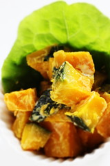 Homemade pumpkin salad in bowl with copy space