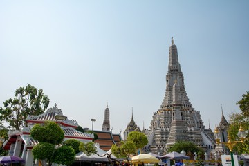 Fototapeta premium Bangkok, Thailand - February 2, 2020, Thailand beautiful iconic decorated by ceramics and porcelains, Wat Aroon (The Temple of Dawn). Destination for tourism.