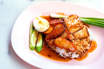 Kaw Moo Dang or Chinese BBQ pork over rice
