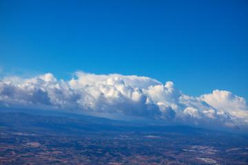 Fototapeta na wymiar view of clouds from airplane window 