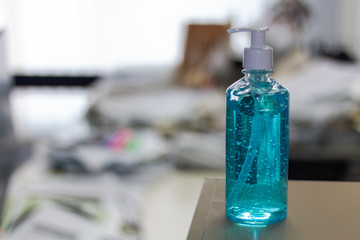 Bottle of alcohol gel is available in an office to allow staff cleaning hands and preventing CORONA Virus