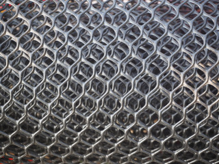 Plastic mesh or black hexagonal extruded plastic netting texture using for garden planting or fencing and plant protection concept.