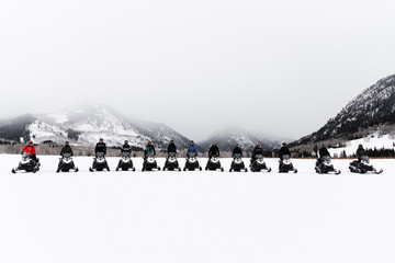 Group of snowmobilers in the backcountry