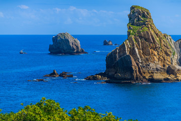 Obraz premium Incredible cliffs on the coast near the village of Liencres. Cantabria. Northern coast of Spain