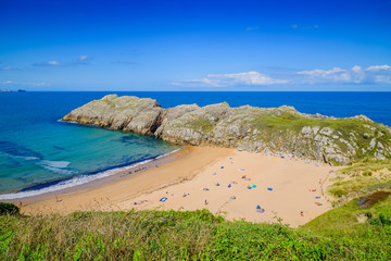 Incredible cliffs on the coast near the village of Liencres. Cantabria. Northern coast of Spain