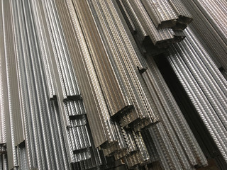 Stack of steel long pipe for industrial and construction work.