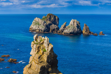 Obraz premium Incredible cliffs on the coast near the village of Liencres. Cantabria. Northern coast of Spain