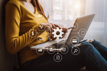 Businesswoman hand working digital marketing media in virtual screen with mobile phone and modern...
