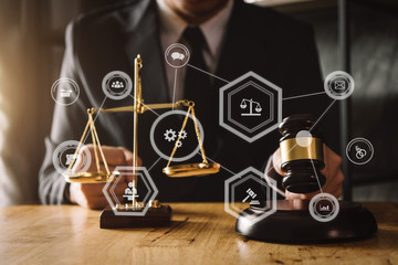 justice and law concept.Male judge in a courtroom on wooden table and Counselor or Male lawyer...