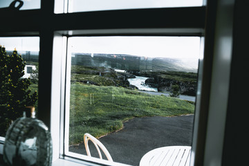 View of icelandic waterfall from a window