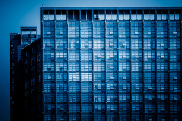 Fototapeta na wymiar Urban abstract - windowed corner of office building.