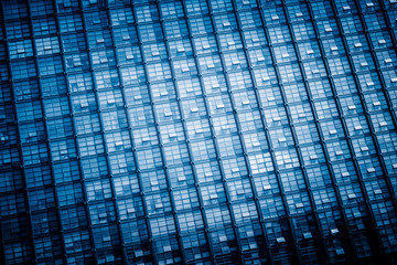 Urban abstract - windowed corner of office building.