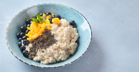 Oatmeal porridge with berries and fruit
