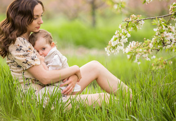Young mother with a newborn son