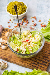 Detox fresh seasonal vegetables salad. Cabbage. Glass bowl. 