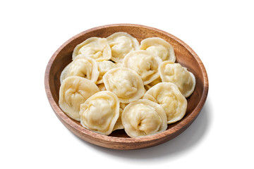 Homemade meat dumplings - russian pelmeni. Dumplings, filled with meat, ravioli. isolated on white background