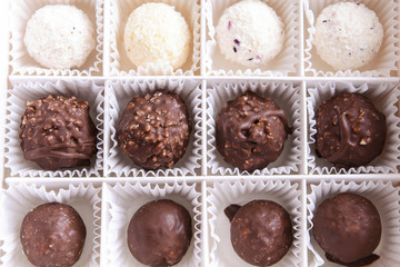 Box with delicious candies, closeup