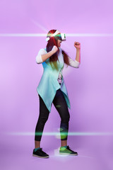 Fototapeta premium Woman is using virtual reality headset.