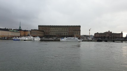 Sea bay on the background of the city and cloudy sky. Spring. Stockholm. Sweden.