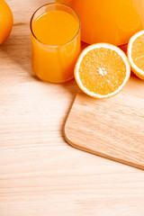 glass and jar of fresh orange juice