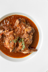 Lamb stew with aromatic herbs seen from above