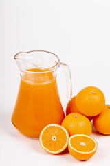 Obraz na płótnie Canvas glass jar of fresh orange juice