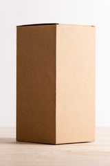 cardboard box  on wooden table