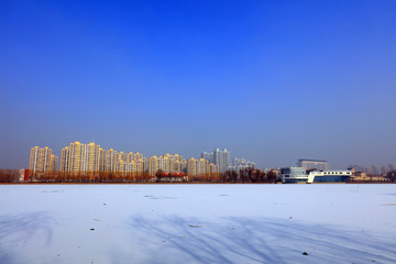 Snowy Landscape of Urban Buildings