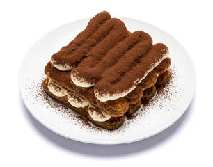 Classic tiramisu dessert on ceramic plate isolated on white background with clipping path
