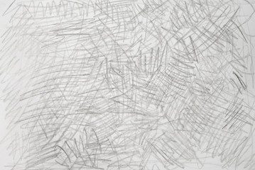gray crayon doodles on paper background texture