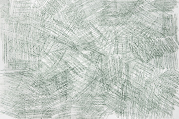 green crayon doodles on paper background texture