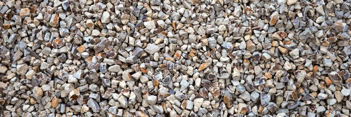 Panoramic image of colorful gravel stones. Gravel stones for the construction industry