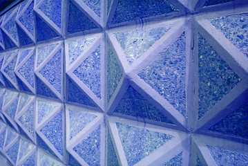 Diminishing perspective geometric 3d concrete wall in blue color