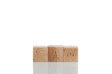 Wooden cubes with letters saw on a white background