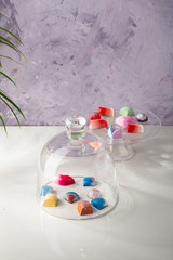 Chocolate candies set on white table