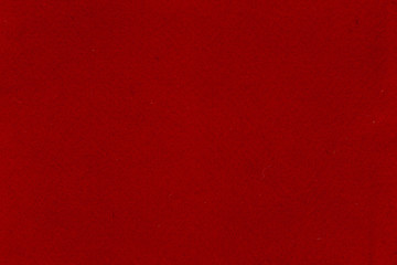 Close-up texture of red felt. Seamless felt texture background.