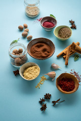 Spices collection on blue surface