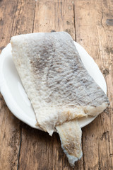 Slice of raw salted codfish