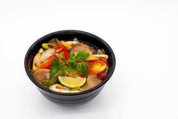 Vegetarian Thai sour clear soup called Mushroom Tom Yum
