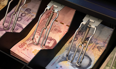 Thai bank notes in the cashier machine