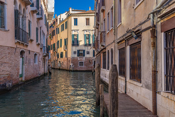 Obraz na płótnie Canvas Gondola to parking in narrow canal, Venice. Italy landscape