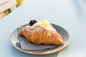 Creamy croissant with berries