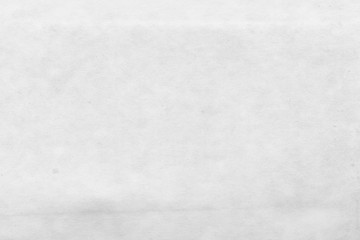 Cardboard white texture close-up. Light old paper background. Grunge concrete wall. Vintage blank wallpaper.